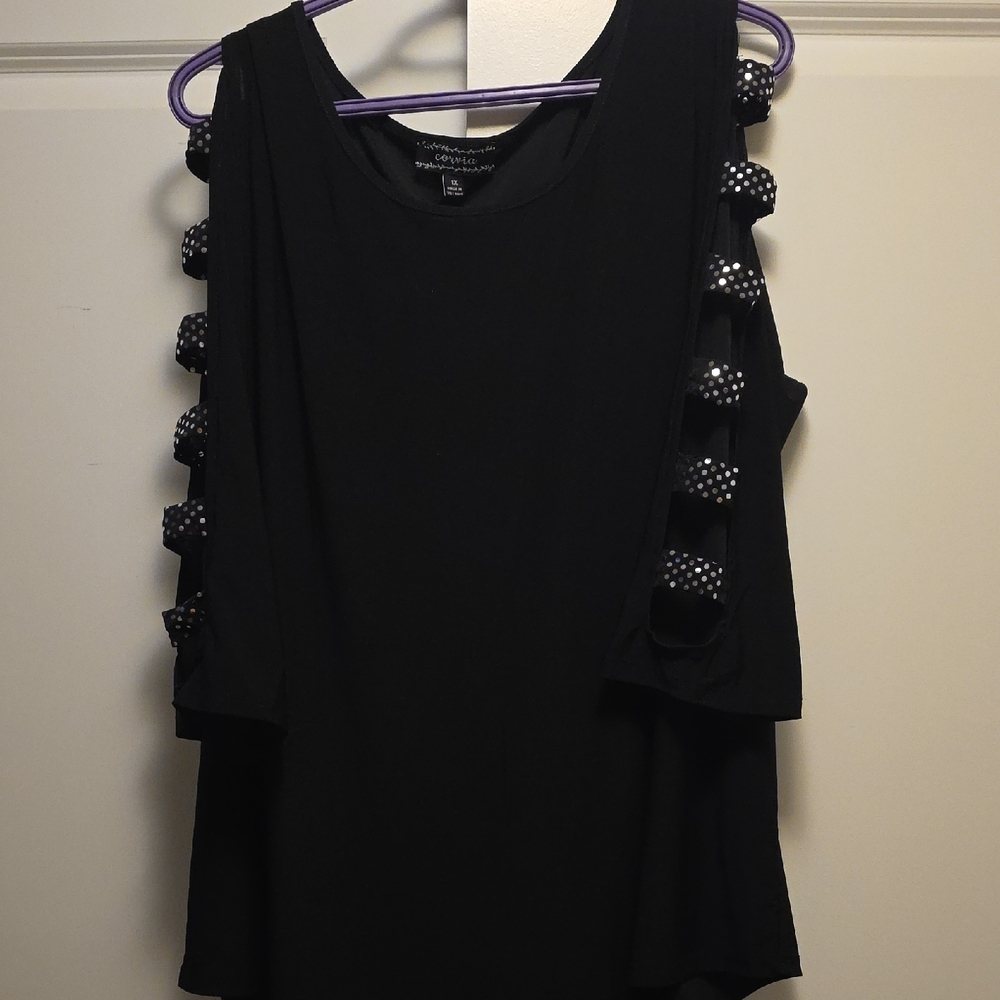 Black Sleeveless Top with Polka Dot Accents